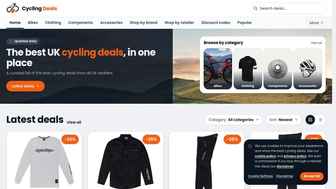 Cycling Deals UK homepage showing a modern deals grid with was/now pricing